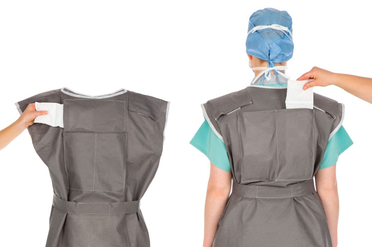 A woman in a CoolSource vest and scrubs, cool and ready for medical procedures.